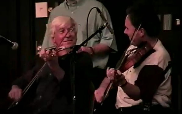 Fiddle players Brendan McGlinchey and Seamus Connolly perform a duet at the 1999 Gaelic Roots Festival.